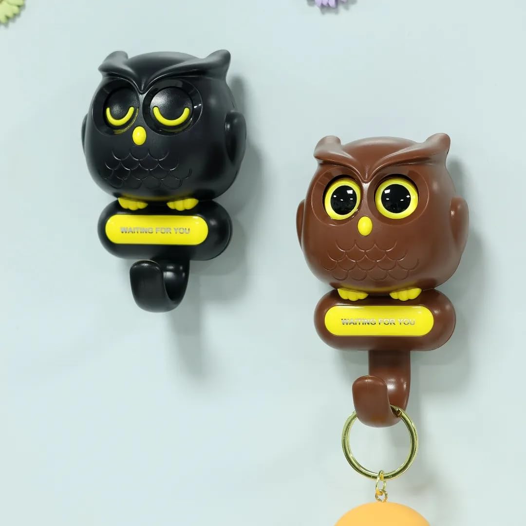 Kowl: Owl Shaped Blinking Eye Wall Hook